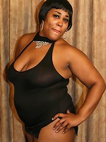 Horny ebony BBW Sasha showing off her huge belly while humping on top of a big black cock